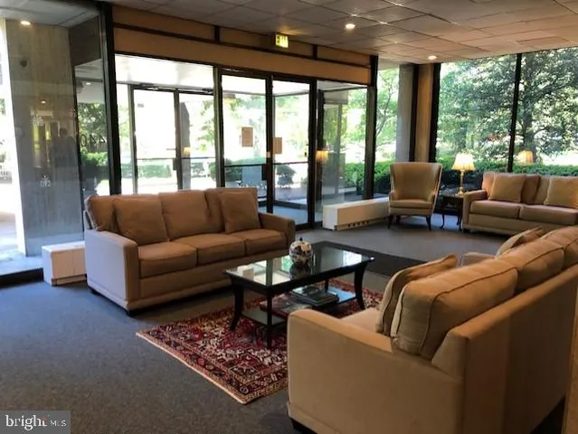 a view of a porch with furniture and yard