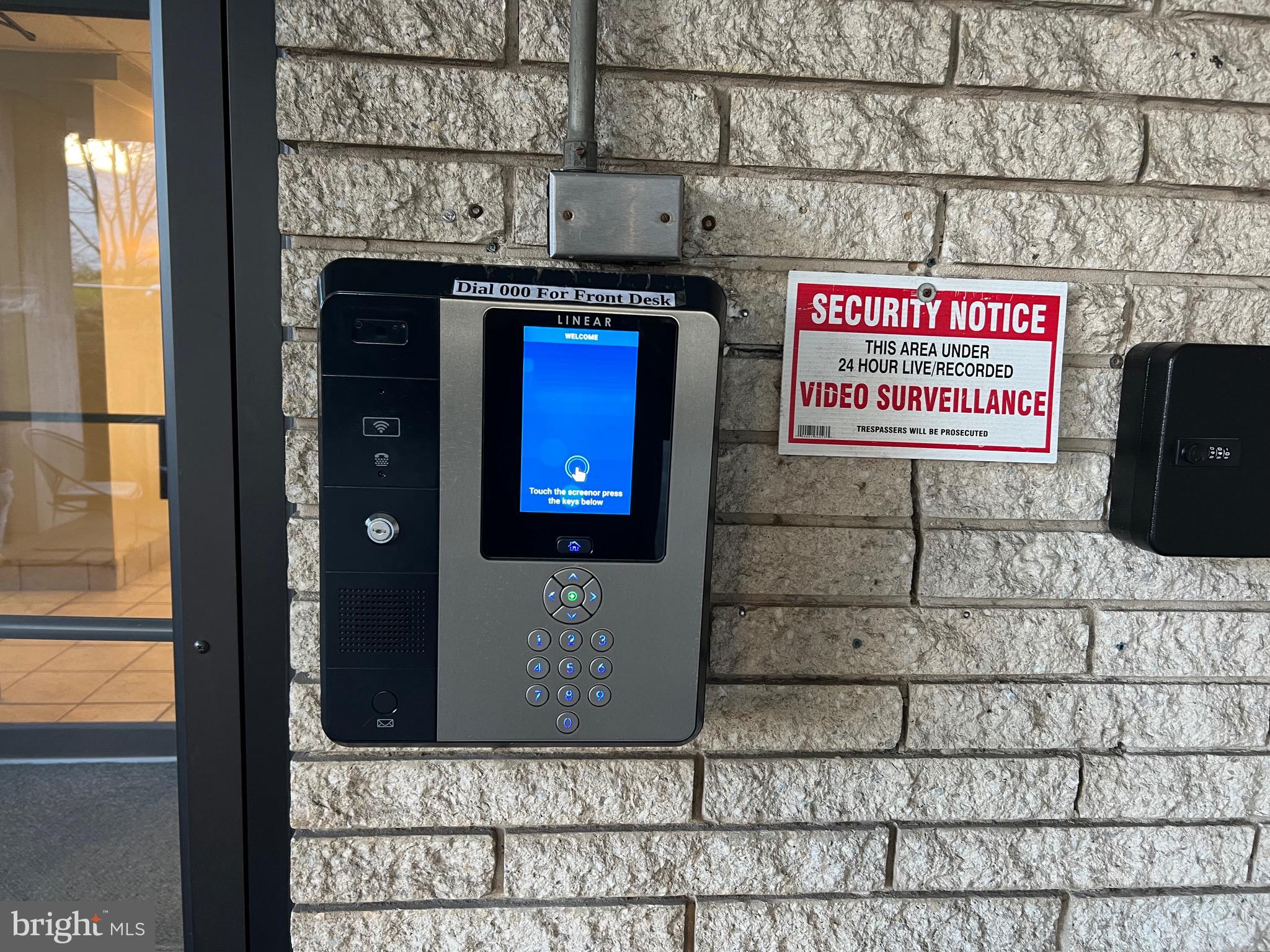 4401 Roland Avenue, Unit 402 Baltimore, MD 21210 - Photo 41 of 43 a sign on the wall of a building