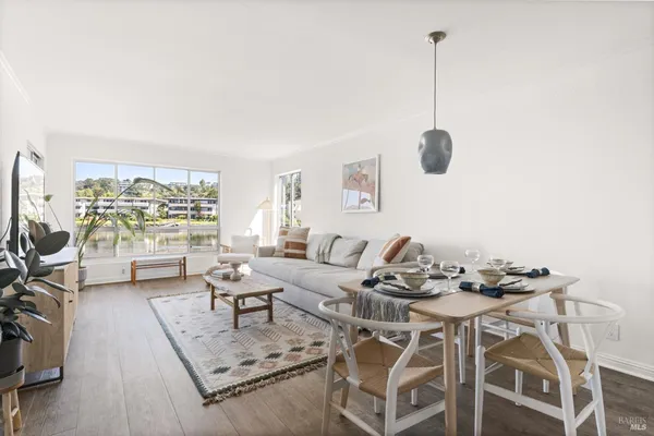 a kitchen with appliances a sink and cabinets