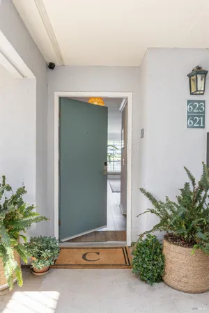 a stove top oven sitting inside of a kitchen