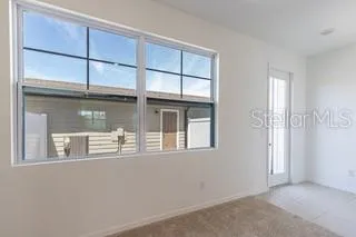 a house view with a backyard