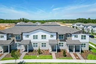a view of staircase with white walls