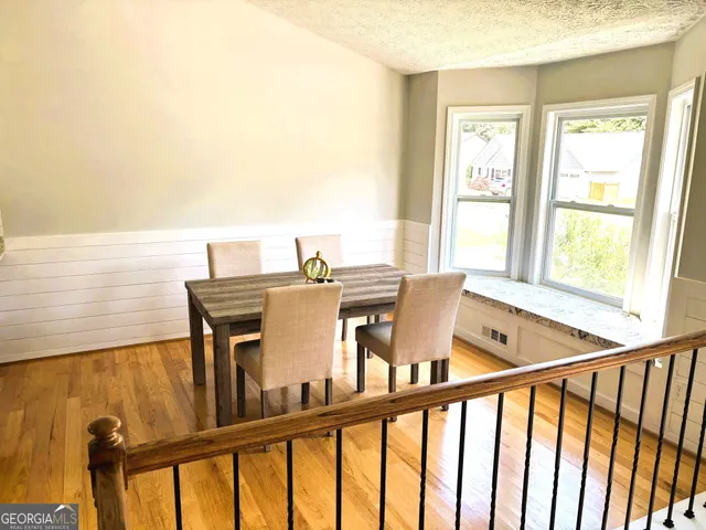 a bedroom with a bed and furniture