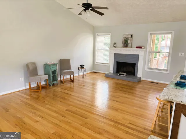 a bedroom with a bed and a mirror