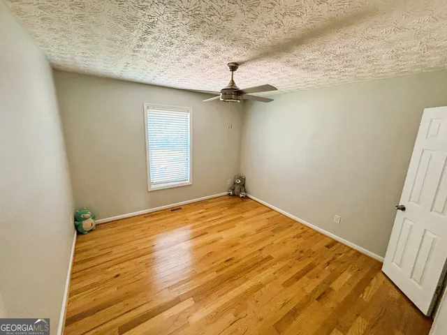 a view of empty room with front door