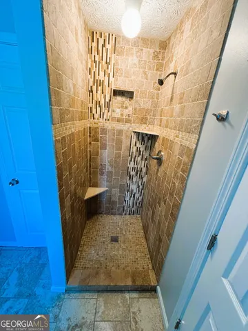 a view of a room with racks on the wall