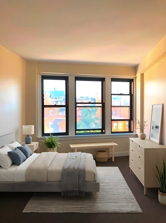475 Commonwealth Avenue, Unit 605 Boston, MA 02215 - Photo 2 of 12 a bedroom with a large bed and a large window