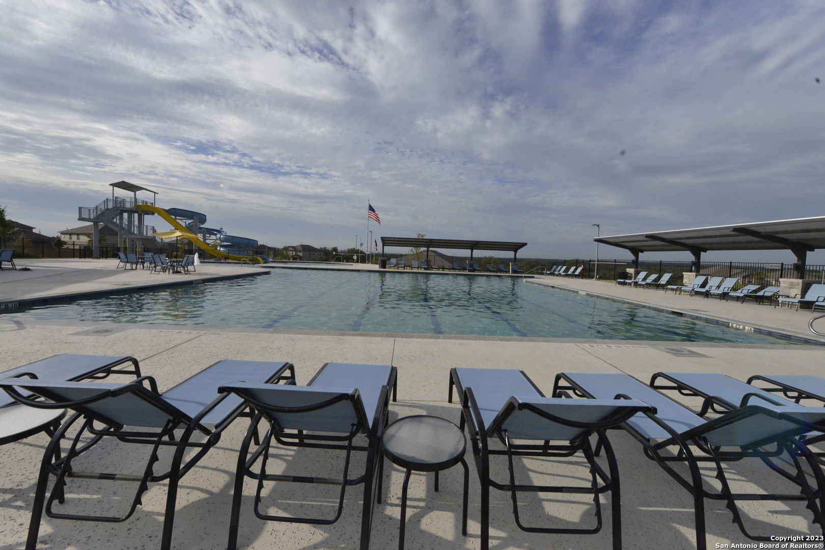 14050 Mudstone Street San Antonio, TX 78253 - Photo 26 of 30 a view of swimming pool with outdoor seating and lake