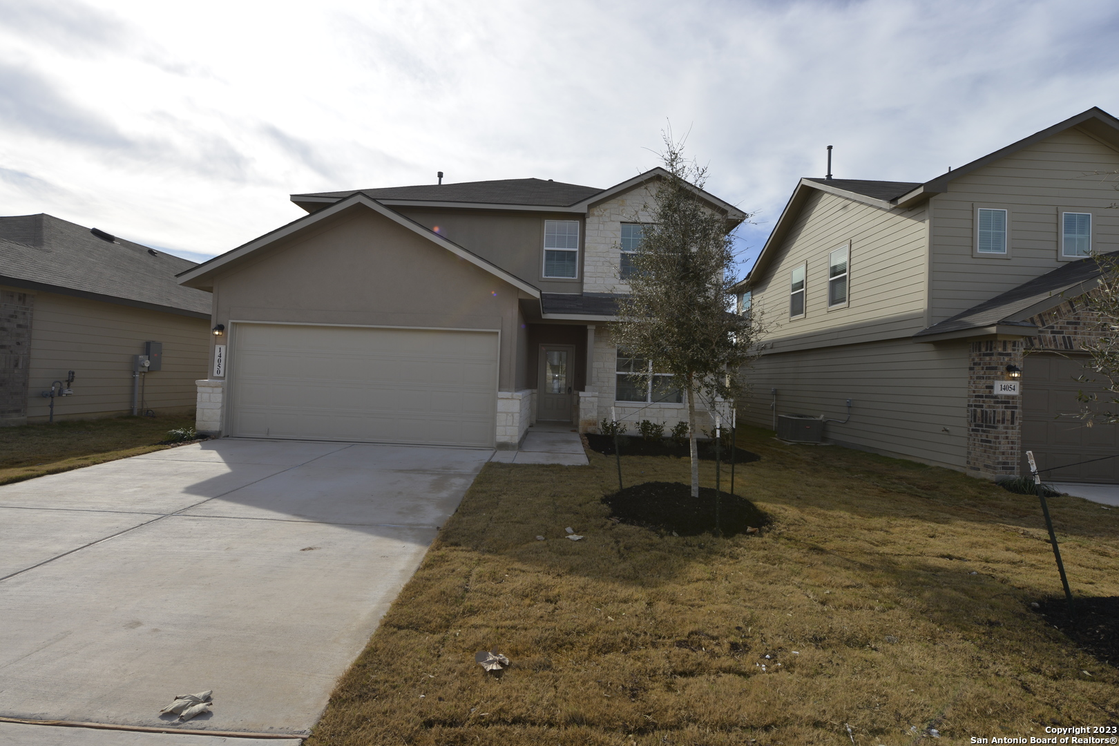 14050 Mudstone Street San Antonio, TX 78253 - Photo 30 of 30 front view of a house with a yard
