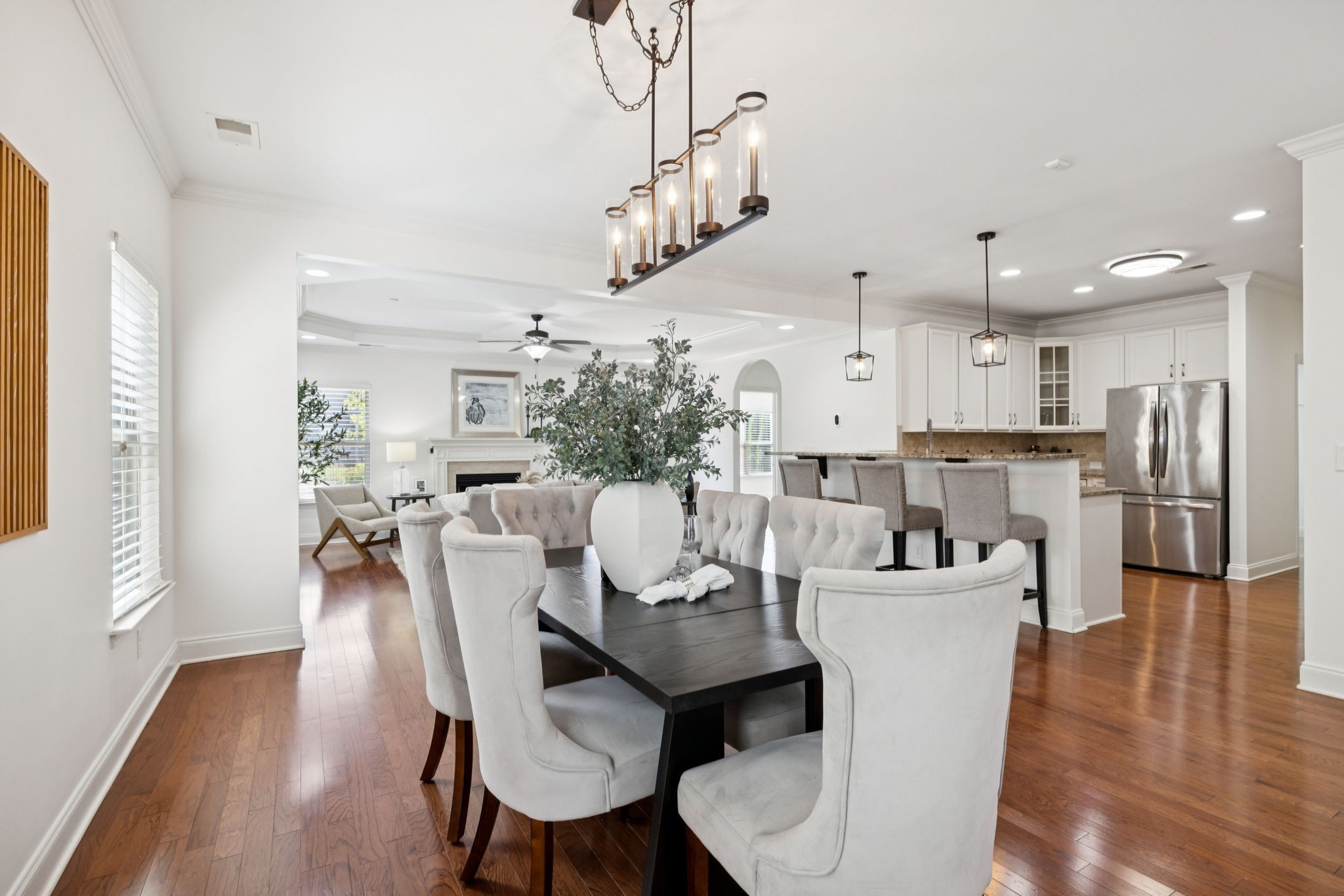 1009 Swanson Lane Franklin, TN 37064 - Photo 13 of 84 a dining room with furniture and wooden floor