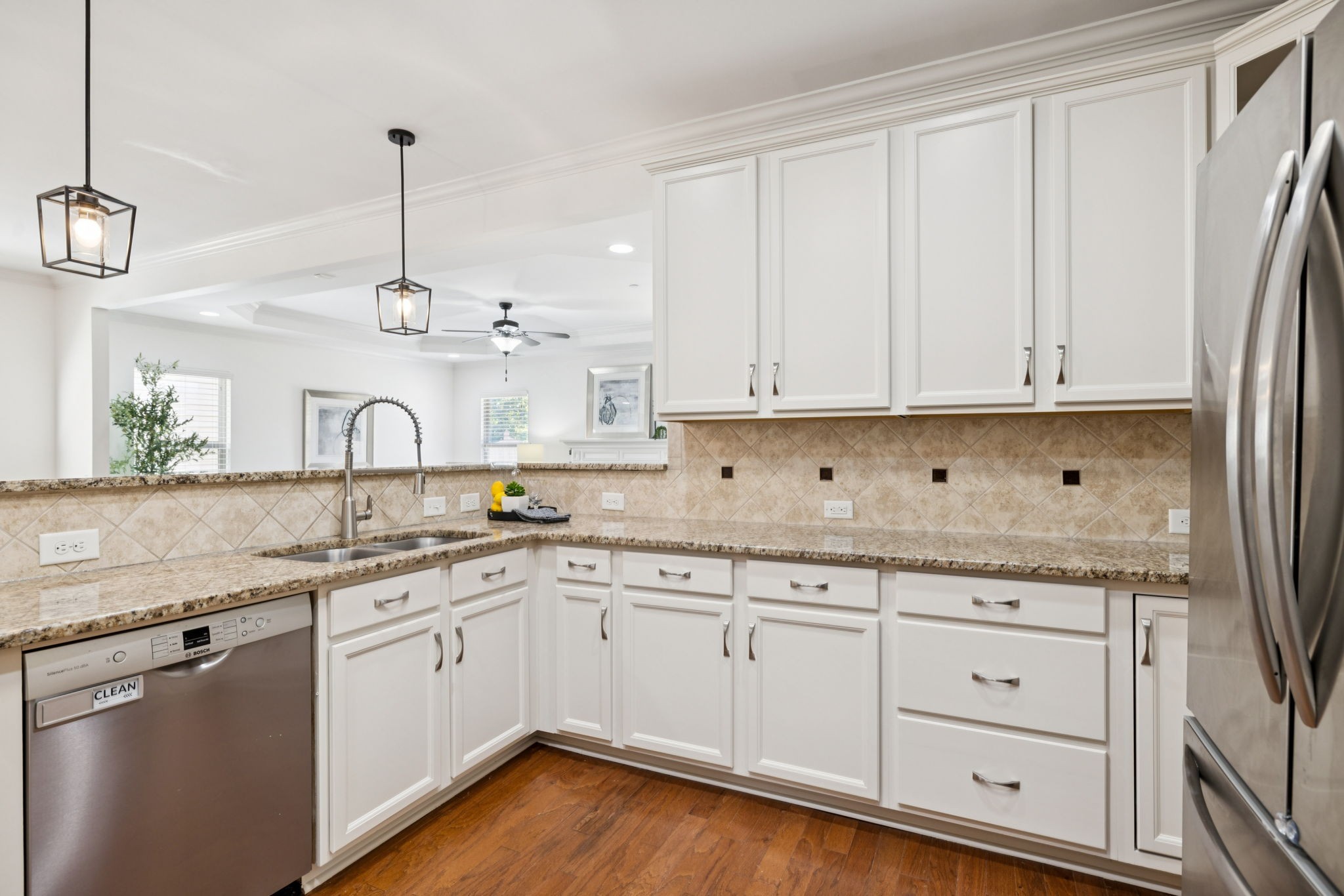 1009 Swanson Lane Franklin, TN 37064 - Photo 22 of 84 a kitchen with appliances cabinets and a sink