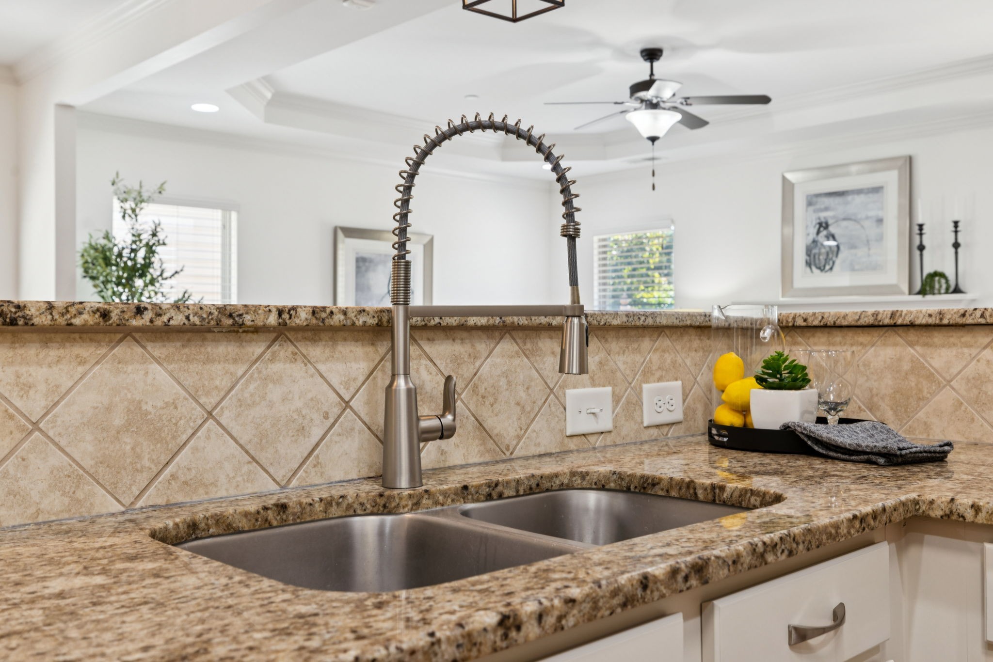 1009 Swanson Lane Franklin, TN 37064 - Photo 26 of 84 a kitchen with a sink and a wooden floor