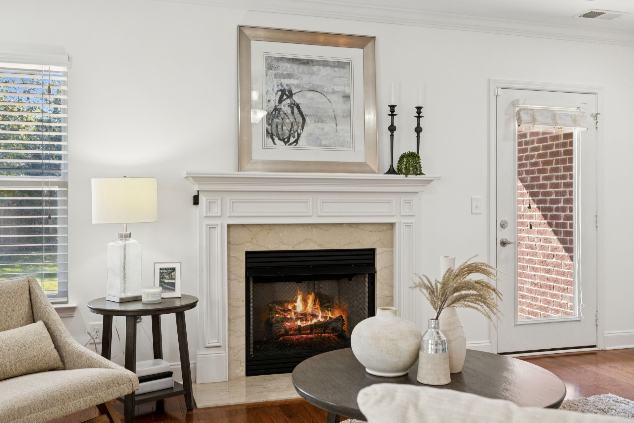 1009 Swanson Lane Franklin, TN 37064 - Photo 29 of 84 a living room with furniture a window and fireplace
