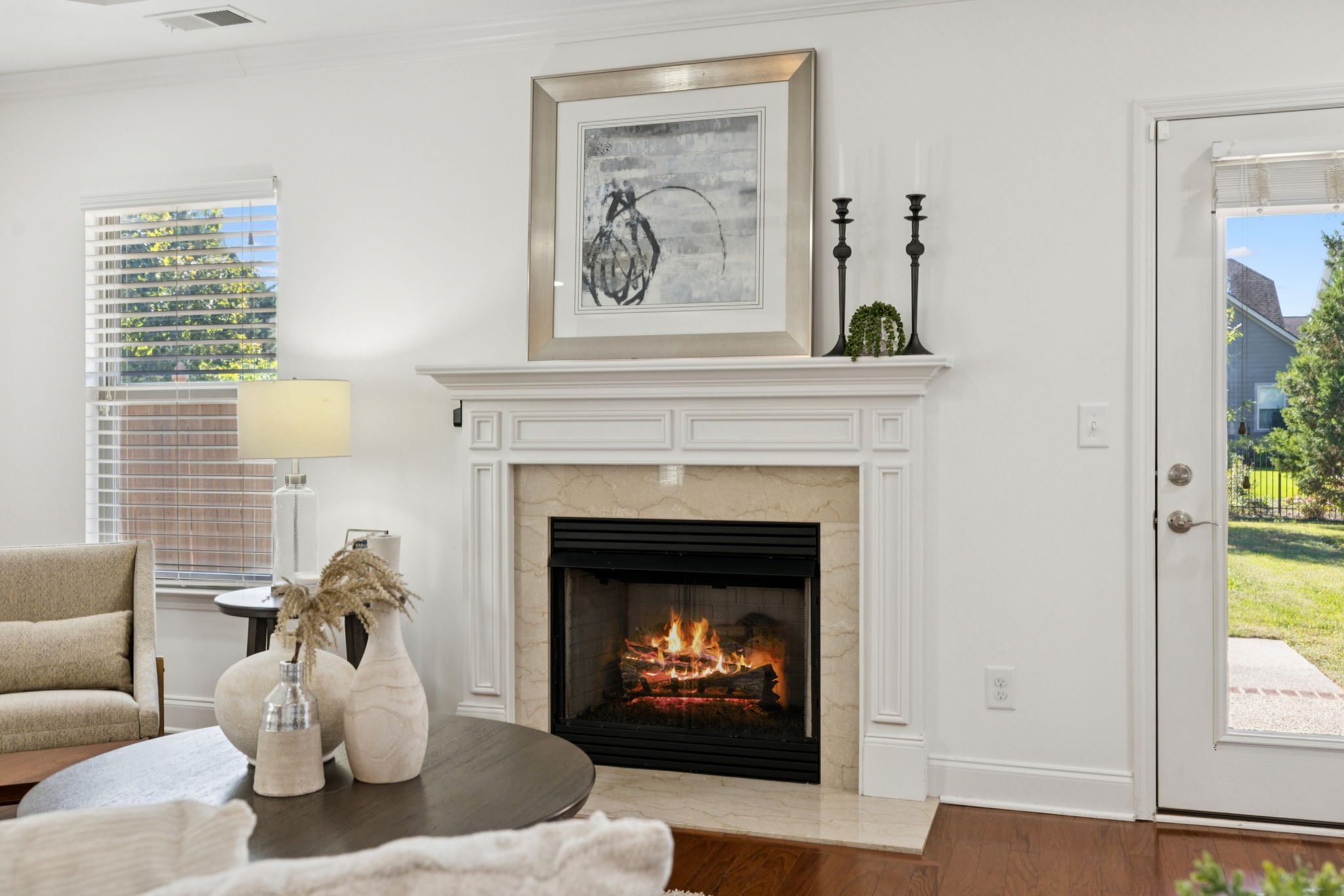 1009 Swanson Lane Franklin, TN 37064 - Photo 31 of 84 a living room with furniture a fireplace and a large window