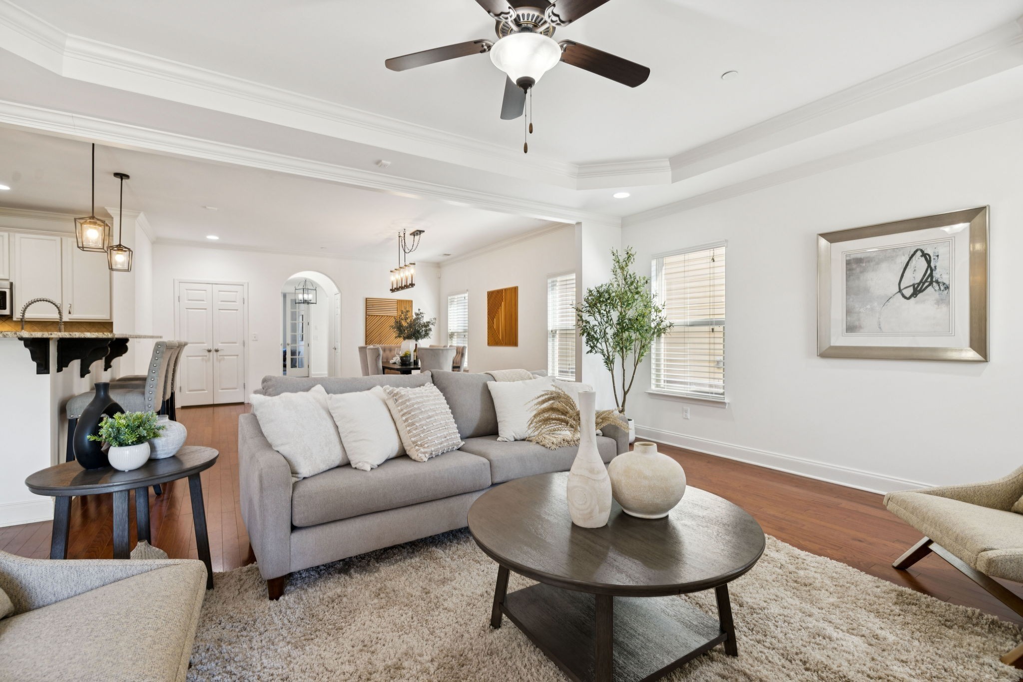 1009 Swanson Lane Franklin, TN 37064 - Photo 35 of 84 a living room with furniture and a chandelier