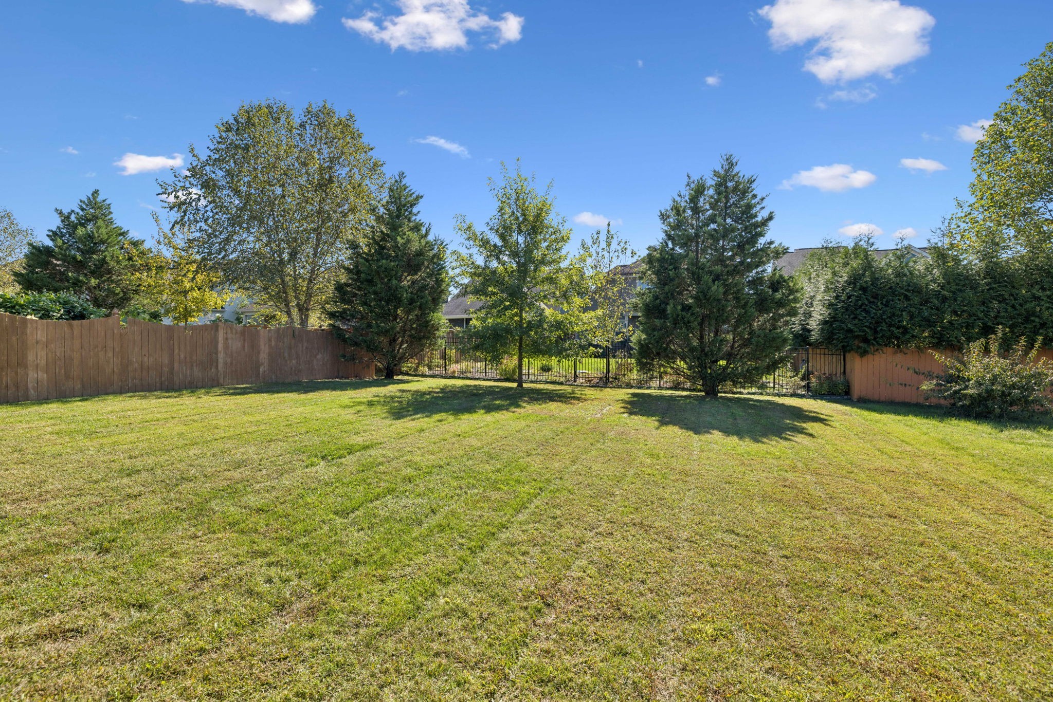 1009 Swanson Lane Franklin, TN 37064 - Photo 67 of 84 a view of a swimming pool with an outdoor space and seating area