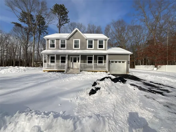 a view of a building with a yard