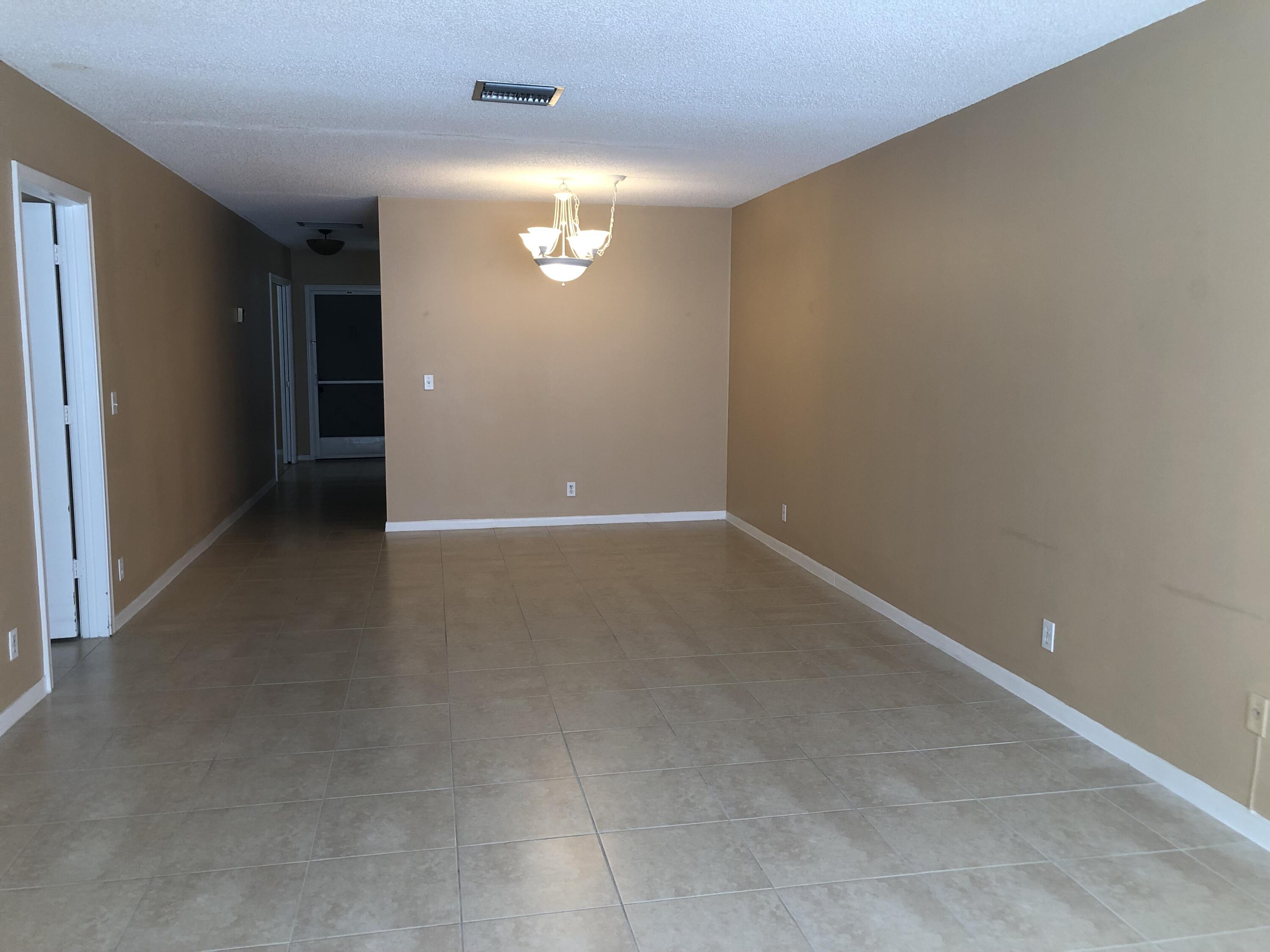 2500 Juniper Drive, Unit 204 Delray Beach, FL 33445 - Photo 6 of 9 a view of an empty room