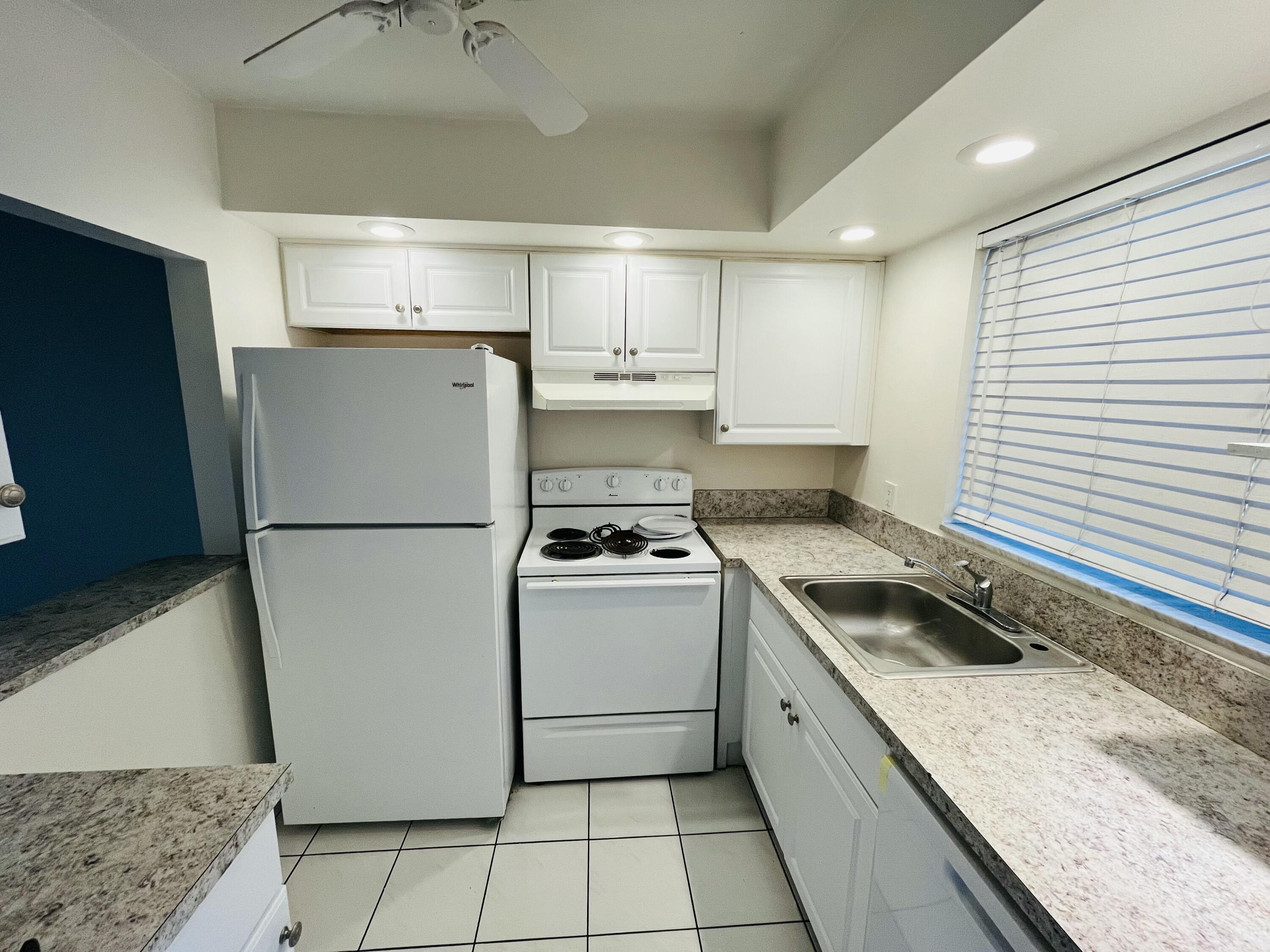 9911 Sandalfoot Boulevard, Unit 112 Boca Raton, FL 33428 - Photo 3 of 13 IMG_7048