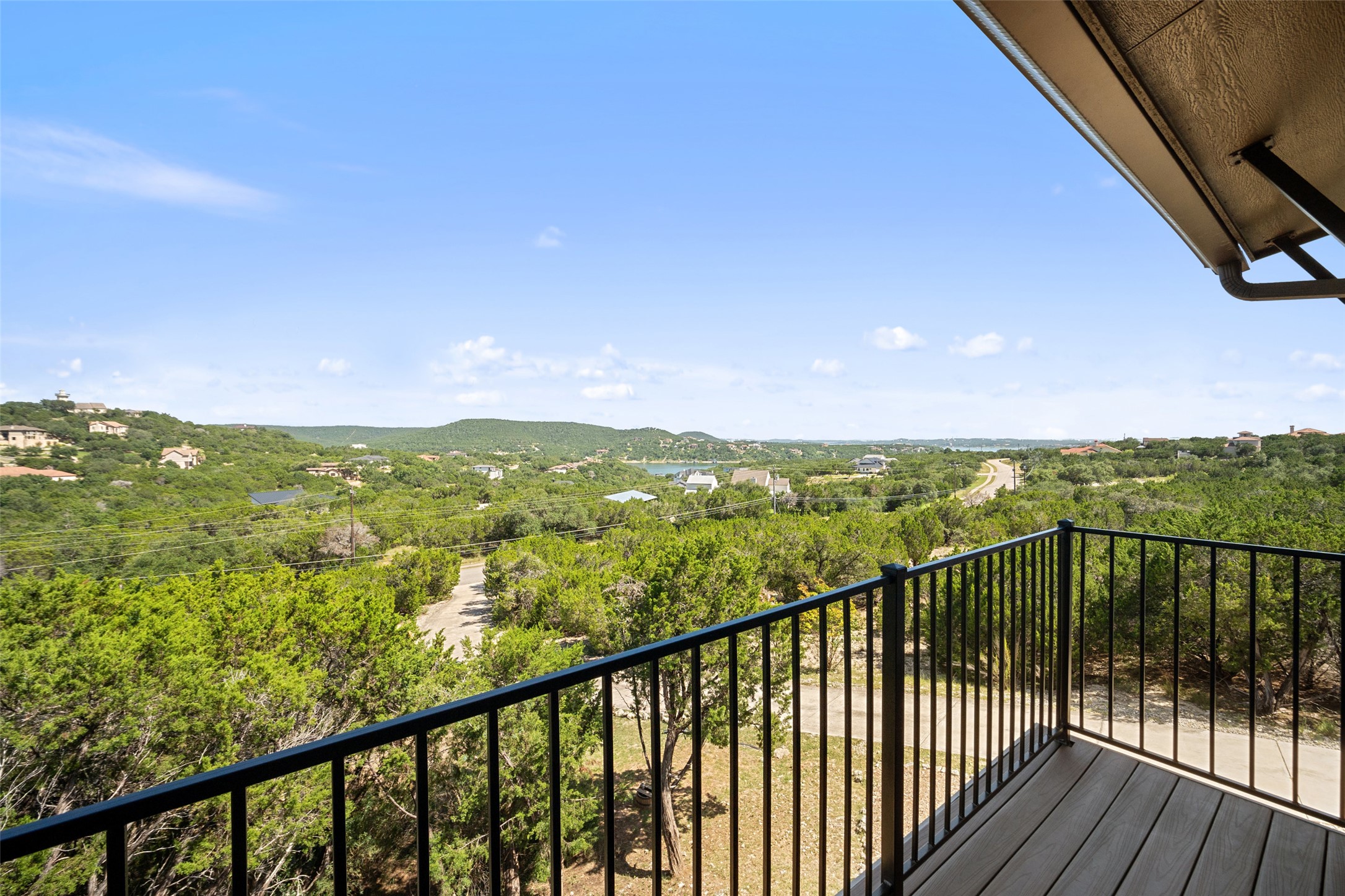 17644 West Reed Park Road Jonestown, TX 78645 - Photo 23 of 36 a view of city and mountain from a balcony