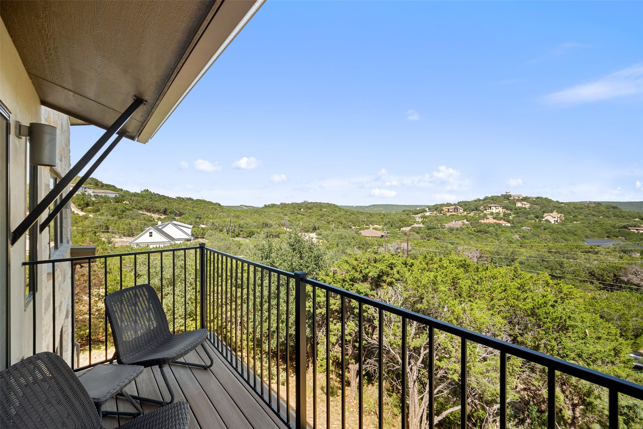 17644 West Reed Park Road Jonestown, TX 78645 - Photo 24 of 36 a view of a two chairs in the balcony