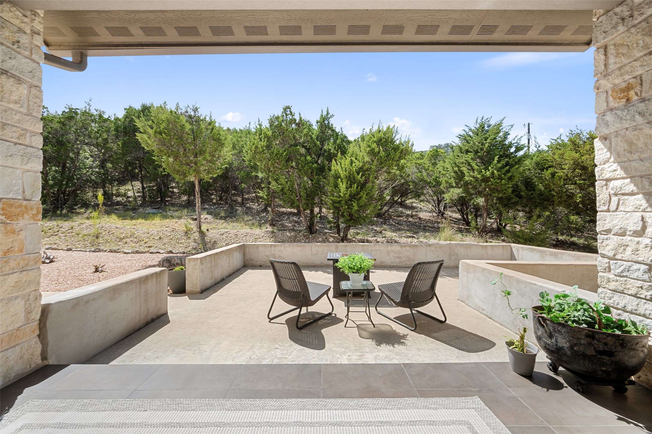 17644 West Reed Park Road Jonestown, TX 78645 - Photo 30 of 36 a view of a swimming pool with outdoor seating and plants