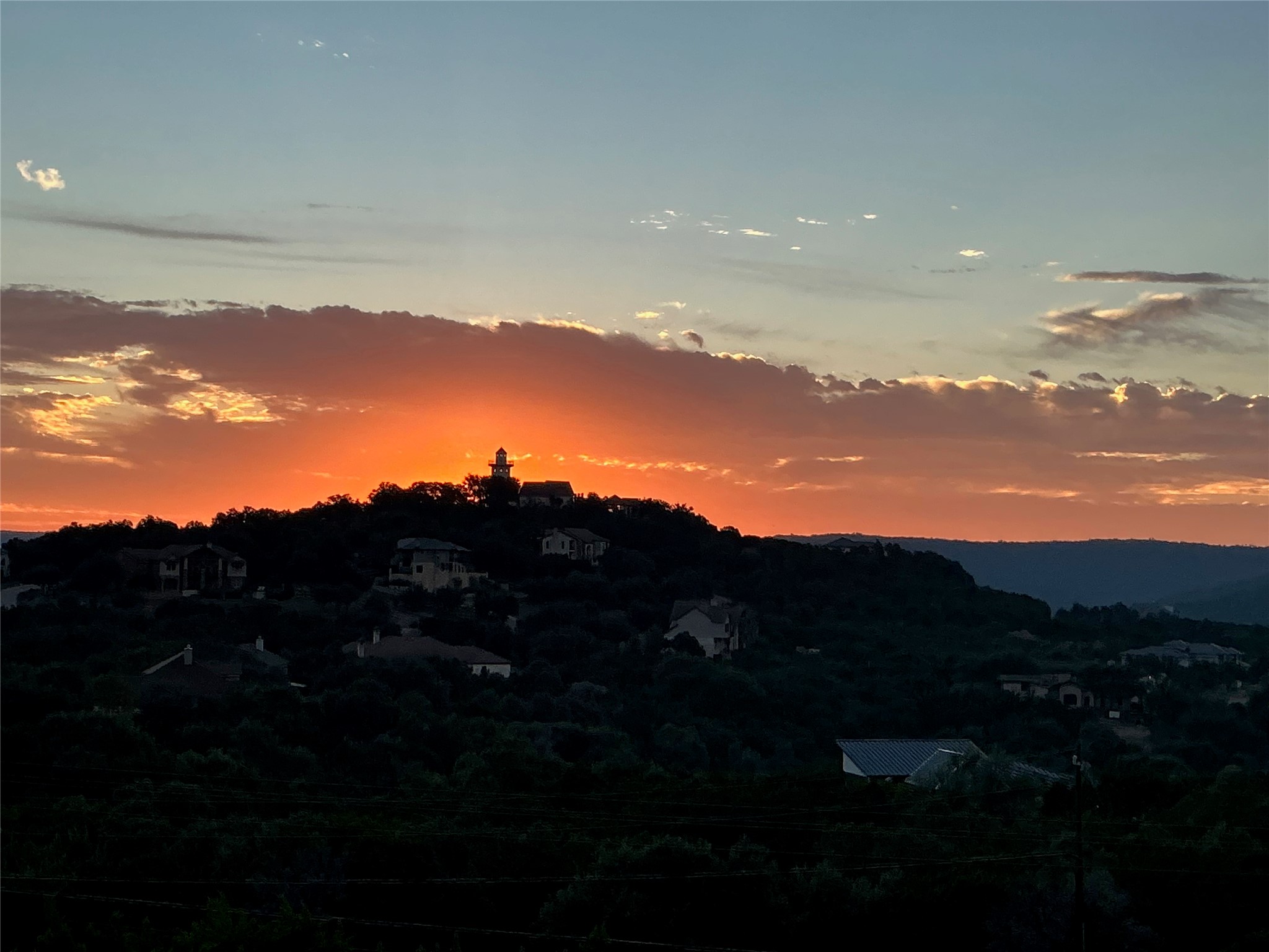 17644 West Reed Park Road Jonestown, TX 78645 - Photo 33 of 36 a view of sunset and a city
