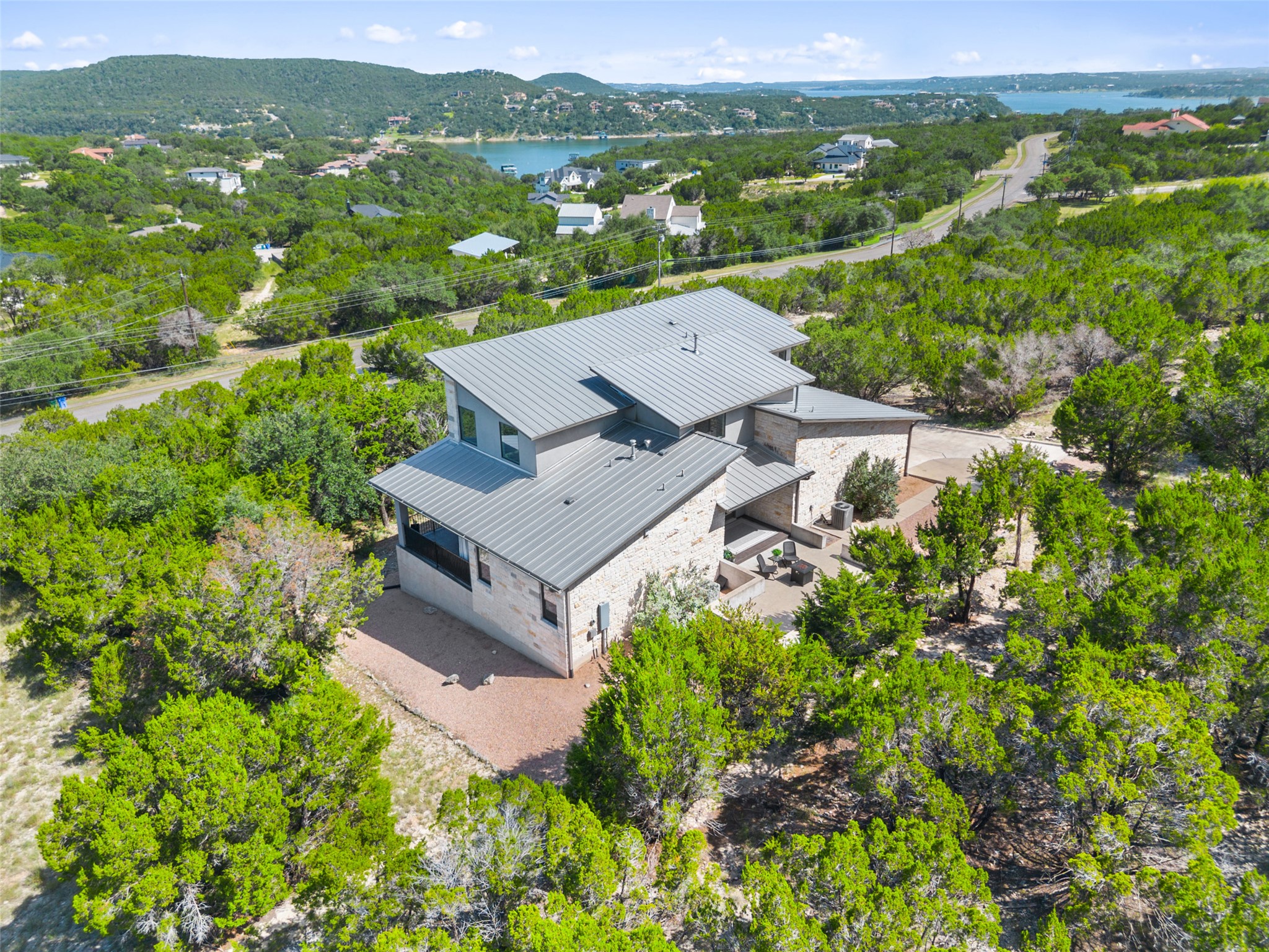 17644 West Reed Park Road Jonestown, TX 78645 - Photo 4 of 36 an aerial view of a house with a garden