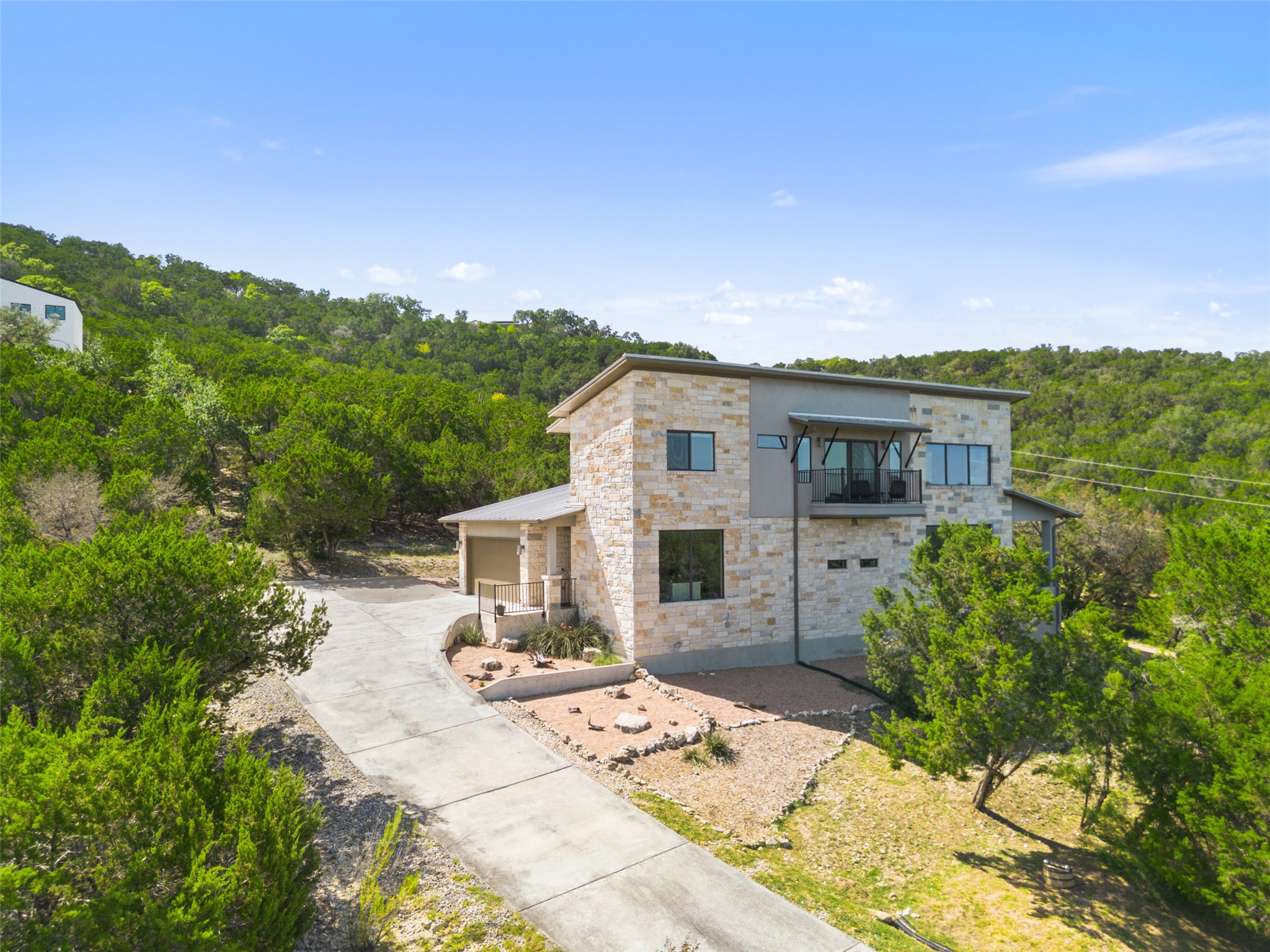 17644 West Reed Park Road Jonestown, TX 78645 - Photo 7 of 36 a view of a house with backyard and sitting area