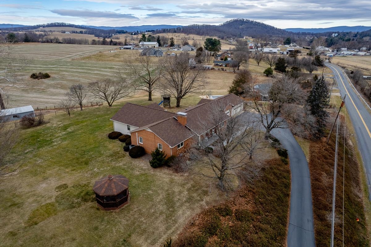2769 Airport Road Bridgewater, VA 22812 - Photo 1 of 70 a view of a lake with a mountain in the background
