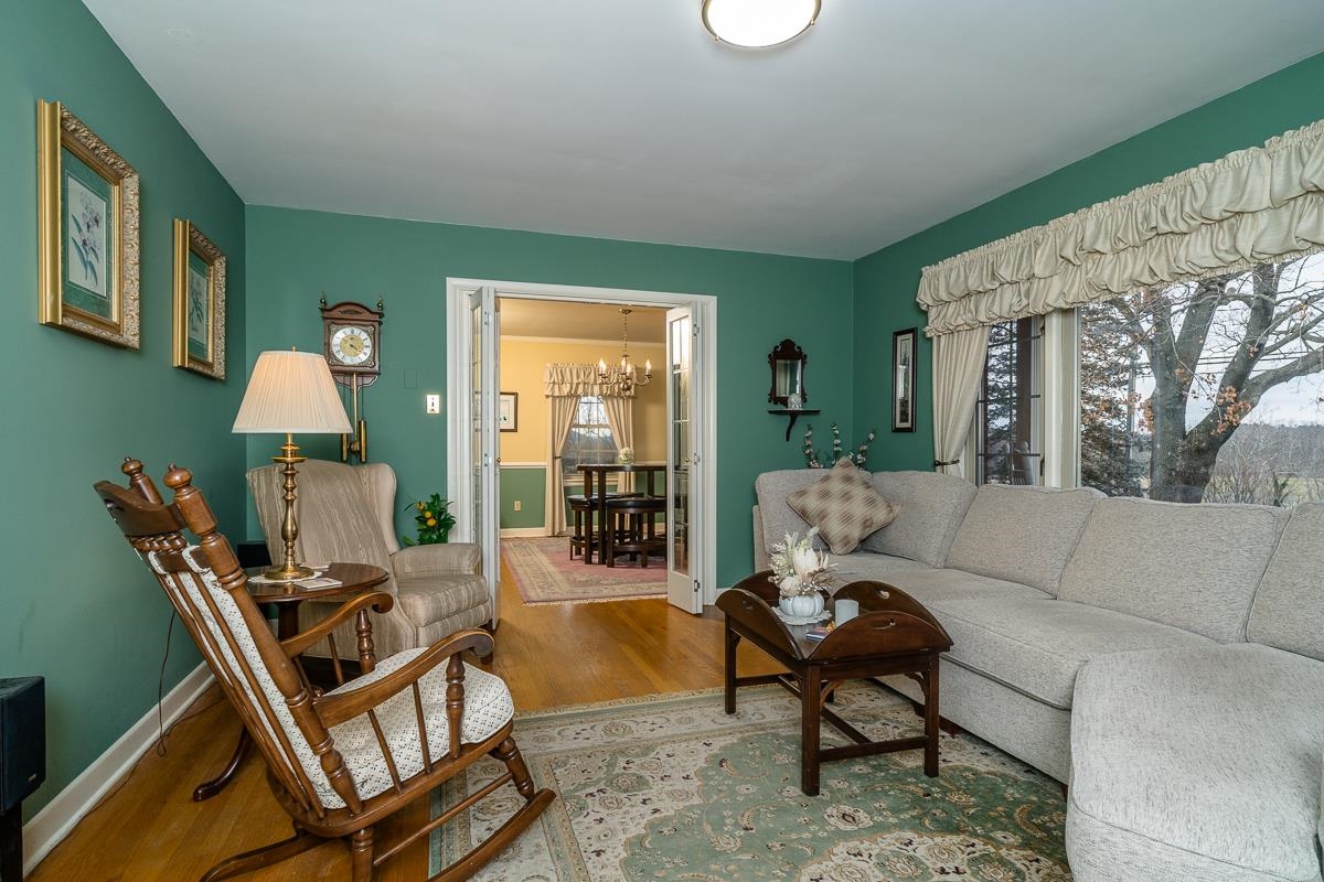 2769 Airport Road Bridgewater, VA 22812 - Photo 12 of 70 a living room with furniture and a wooden floor