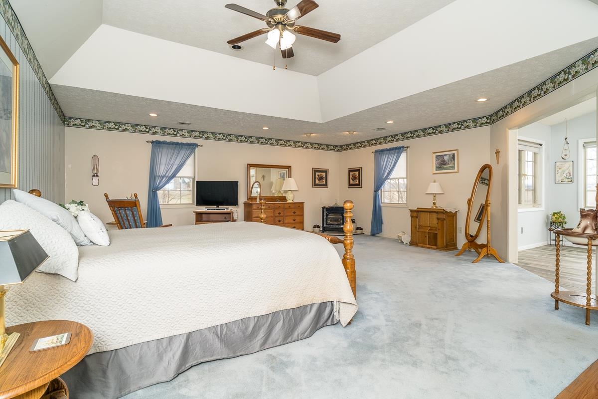 2769 Airport Road Bridgewater, VA 22812 - Photo 14 of 70 a bed room with a bed mirror and a chair