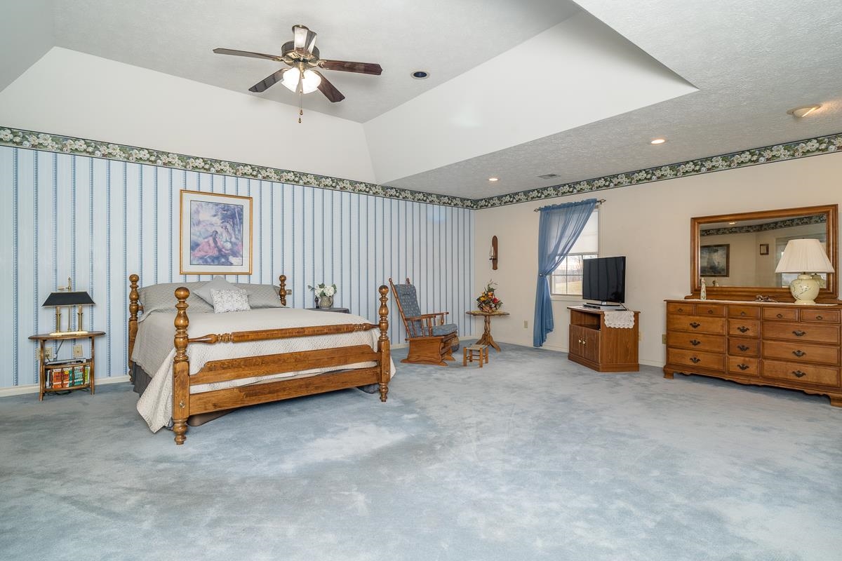 2769 Airport Road Bridgewater, VA 22812 - Photo 15 of 70 a bedroom with furniture and a flat screen tv