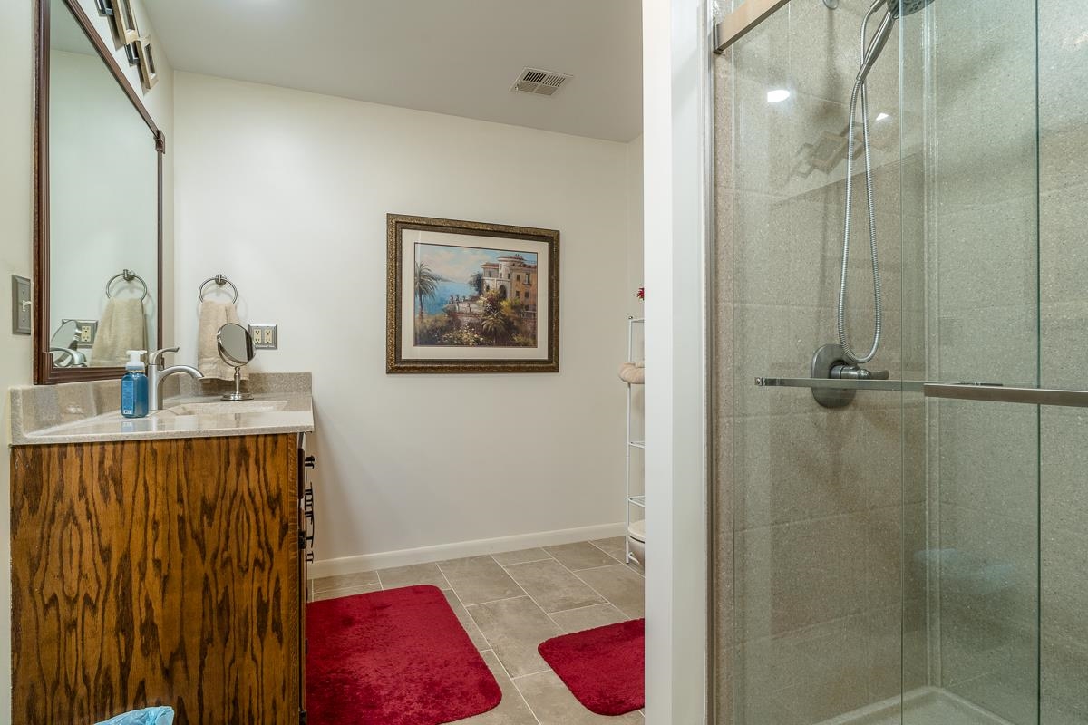 2769 Airport Road Bridgewater, VA 22812 - Photo 23 of 70 a bathroom with a sink and a mirror