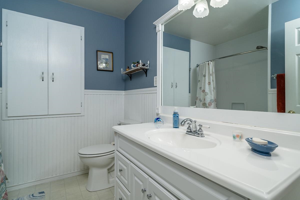 2769 Airport Road Bridgewater, VA 22812 - Photo 24 of 70 a bathroom with a sink a toilet and a mirror