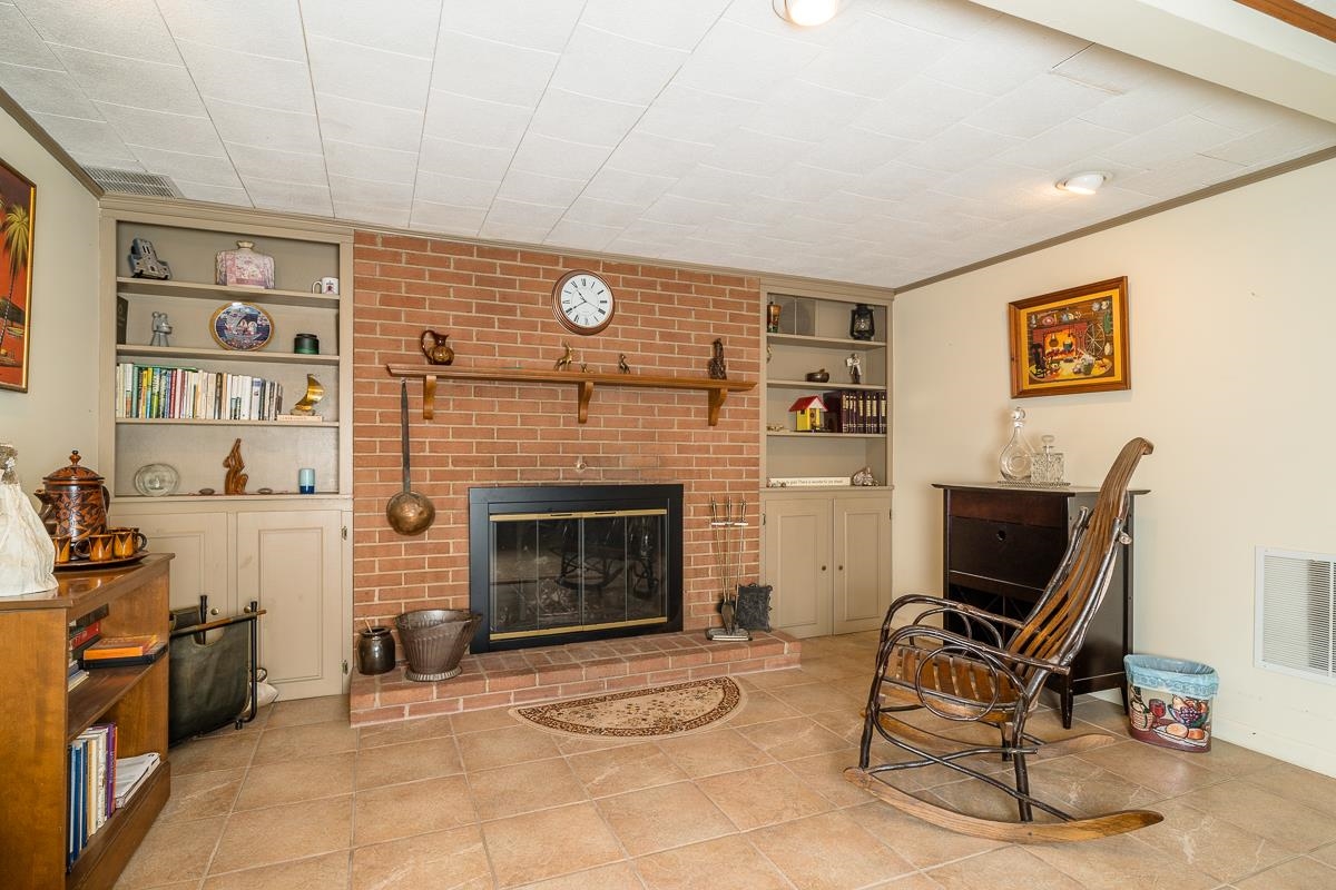 2769 Airport Road Bridgewater, VA 22812 - Photo 29 of 70 a living room with furniture and a fireplace