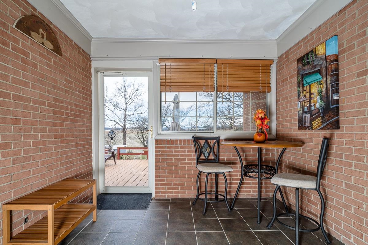 2769 Airport Road Bridgewater, VA 22812 - Photo 39 of 70 a dining room with furniture and large windows