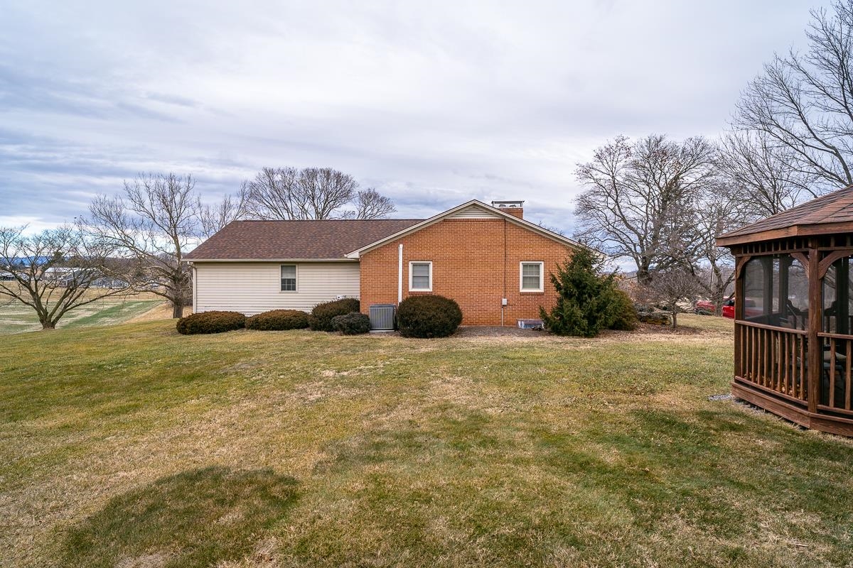 2769 Airport Road Bridgewater, VA 22812 - Photo 58 of 70 a view of a house with backyard and trees