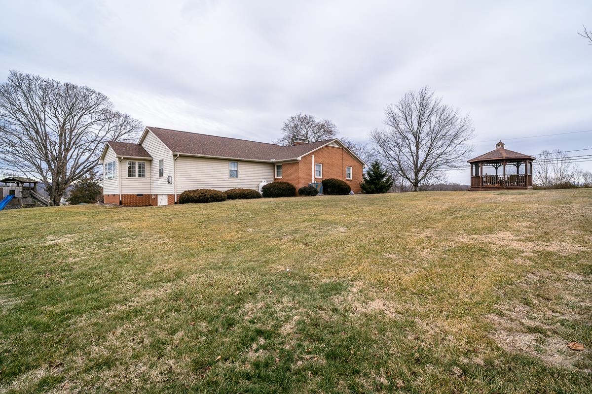 2769 Airport Road Bridgewater, VA 22812 - Photo 60 of 70 a front view of house with yard and trees around
