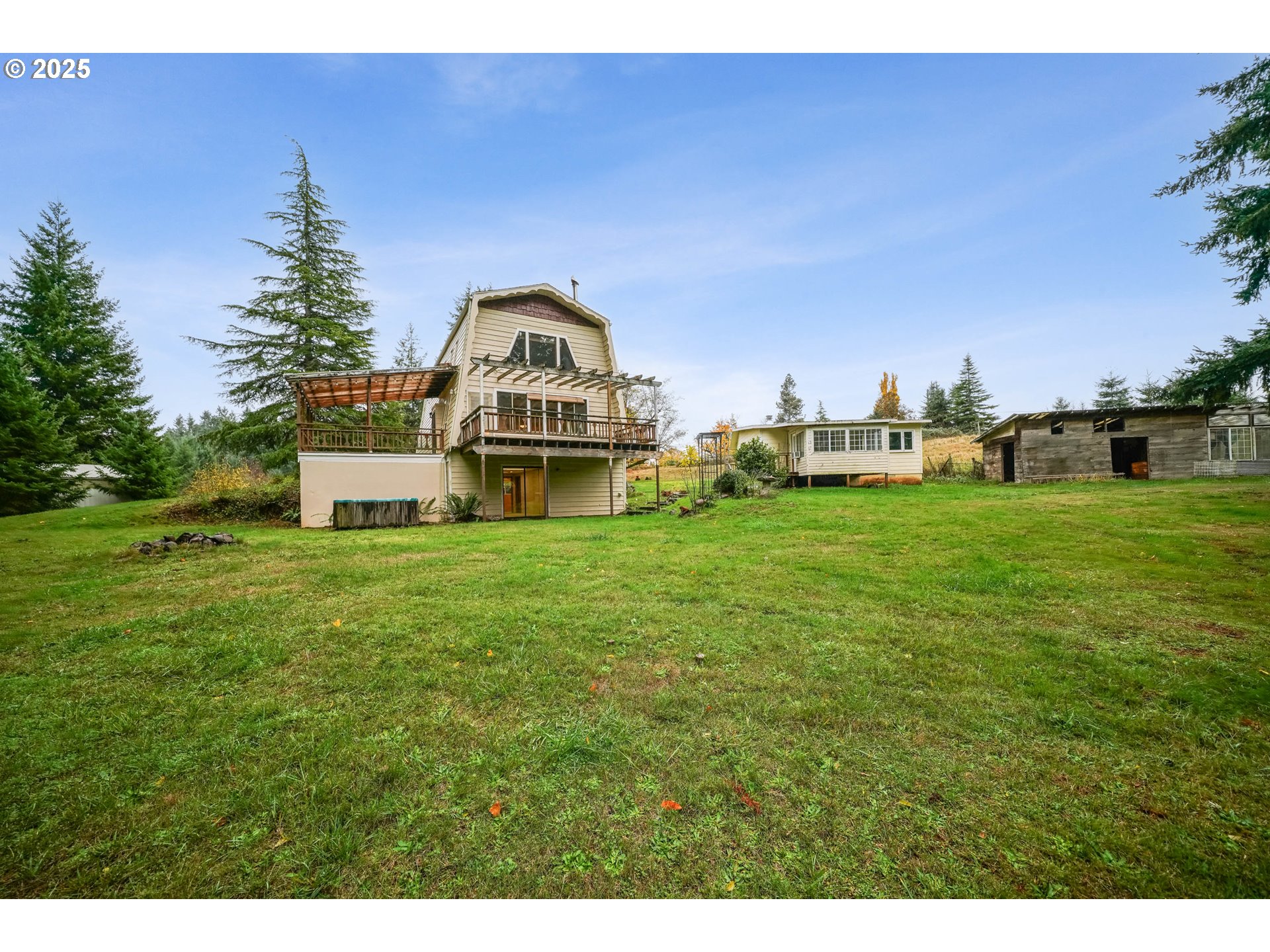 20125 McKillop Road Scotts Mills, OR 97375 - Photo 2 of 47 a front view of a house with a yard