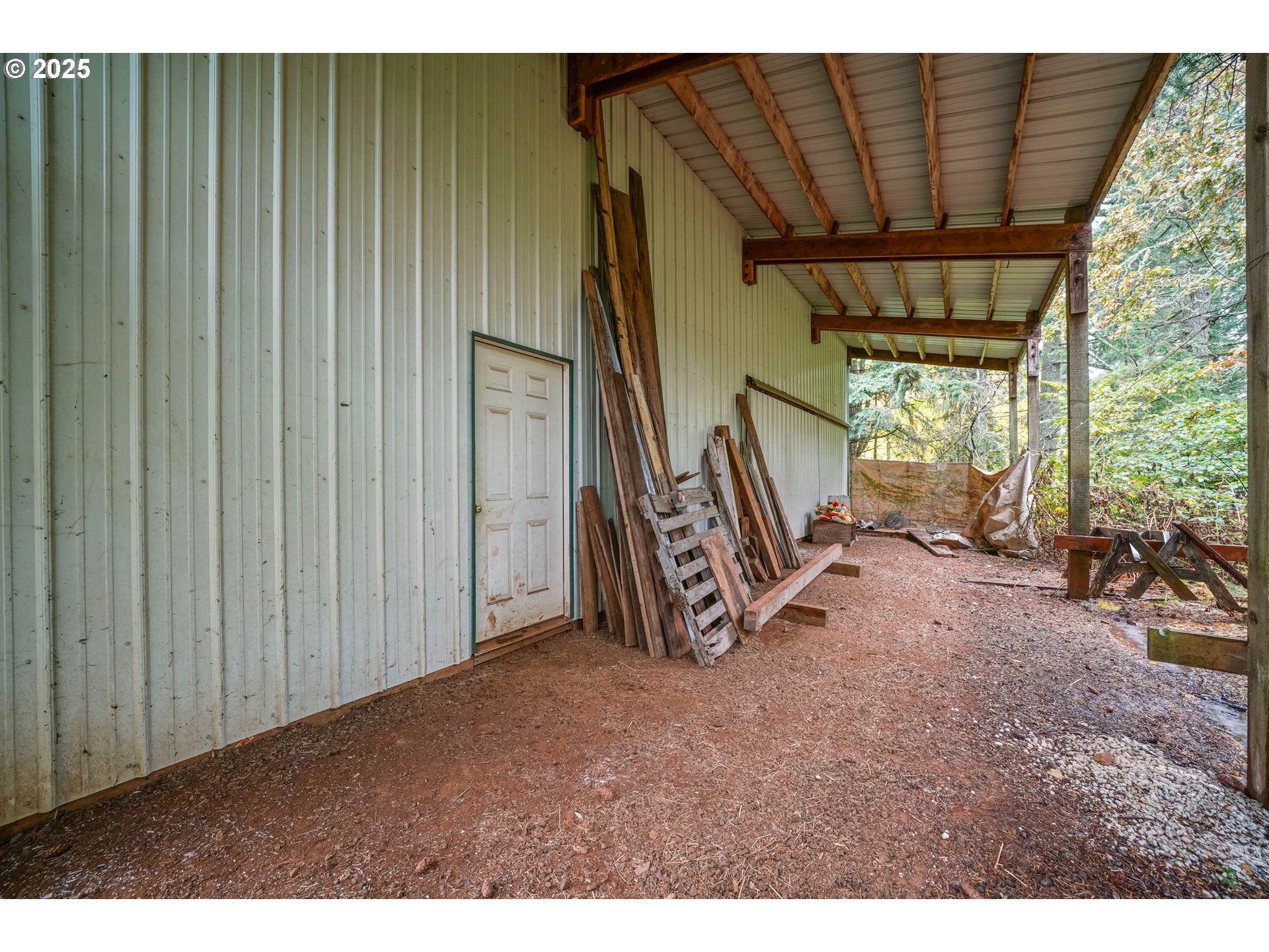20125 McKillop Road Scotts Mills, OR 97375 - Photo 37 of 47 a view of an empty room with a fireplace