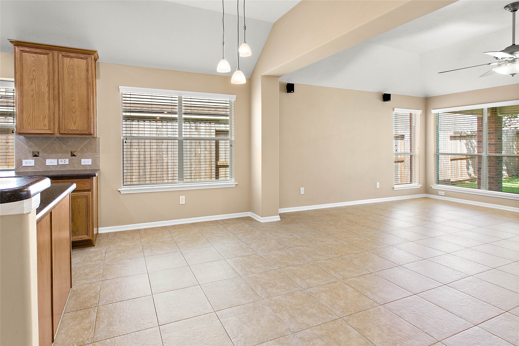 30411 Deleon Fields Drive Spring, TX 77386 - Photo 12 of 24 Spacious and airy open living area provides comfort and connection to the outdoors.