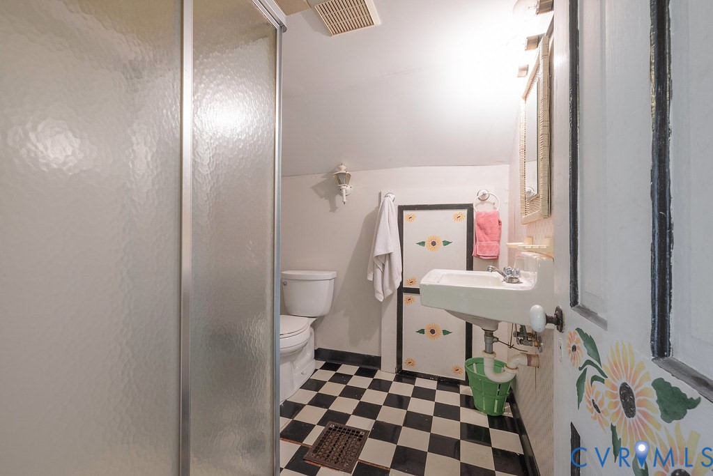 1881 Fairport Road Reedville, VA 22539 - Photo 36 of 54 Frosted glass shower enclosure, checkerboard floor