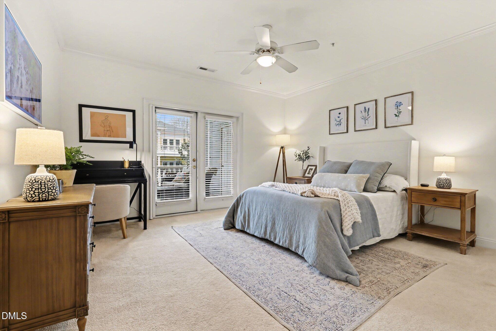 7530 Lead Mine Road, Unit 202 Raleigh, NC 27615 - Photo 10 of 36 a spacious bedroom with a bed and wooden floor