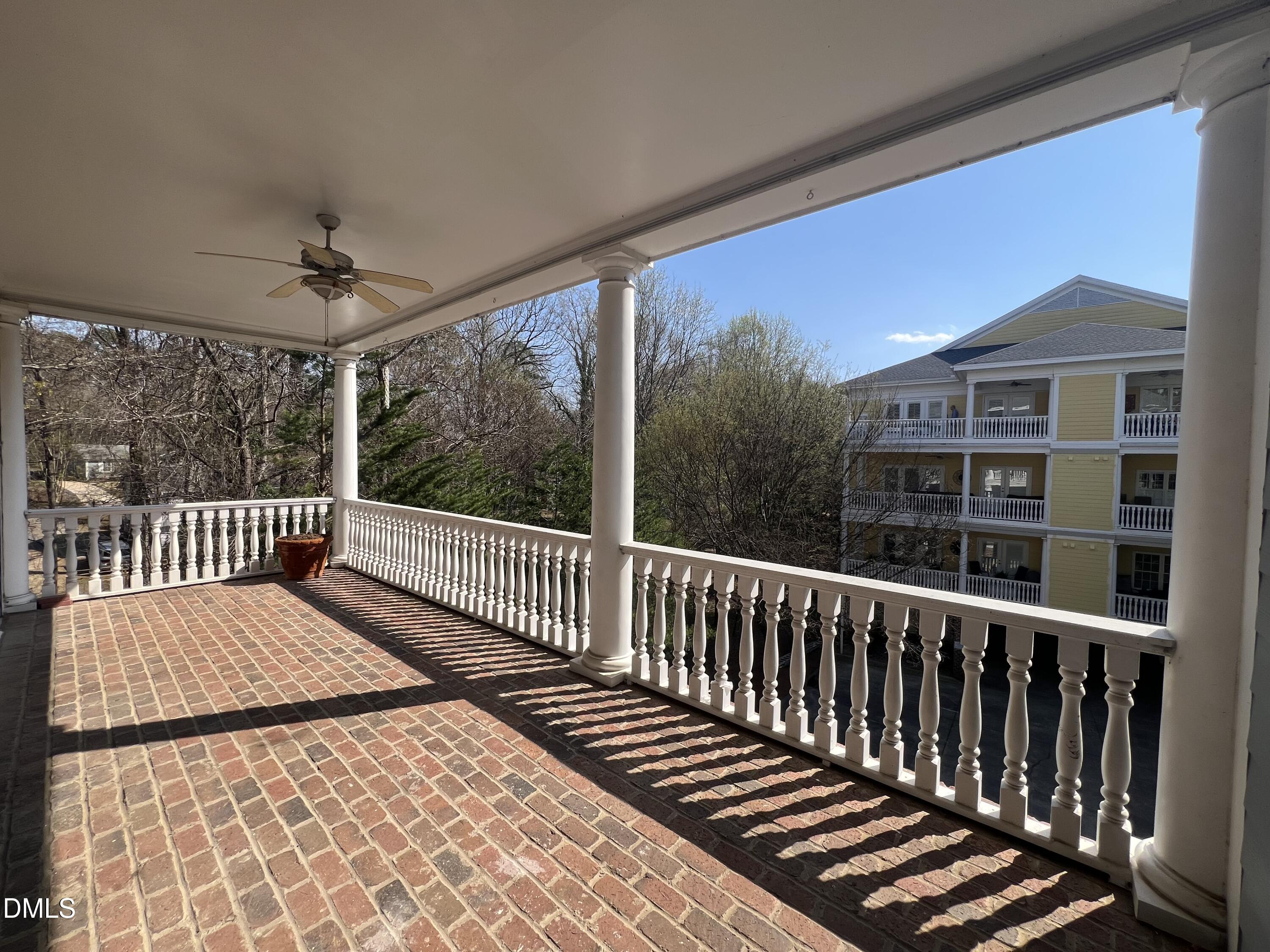 7530 Lead Mine Road, Unit 202 Raleigh, NC 27615 - Photo 22 of 36 a view of a balcony with wooden floor