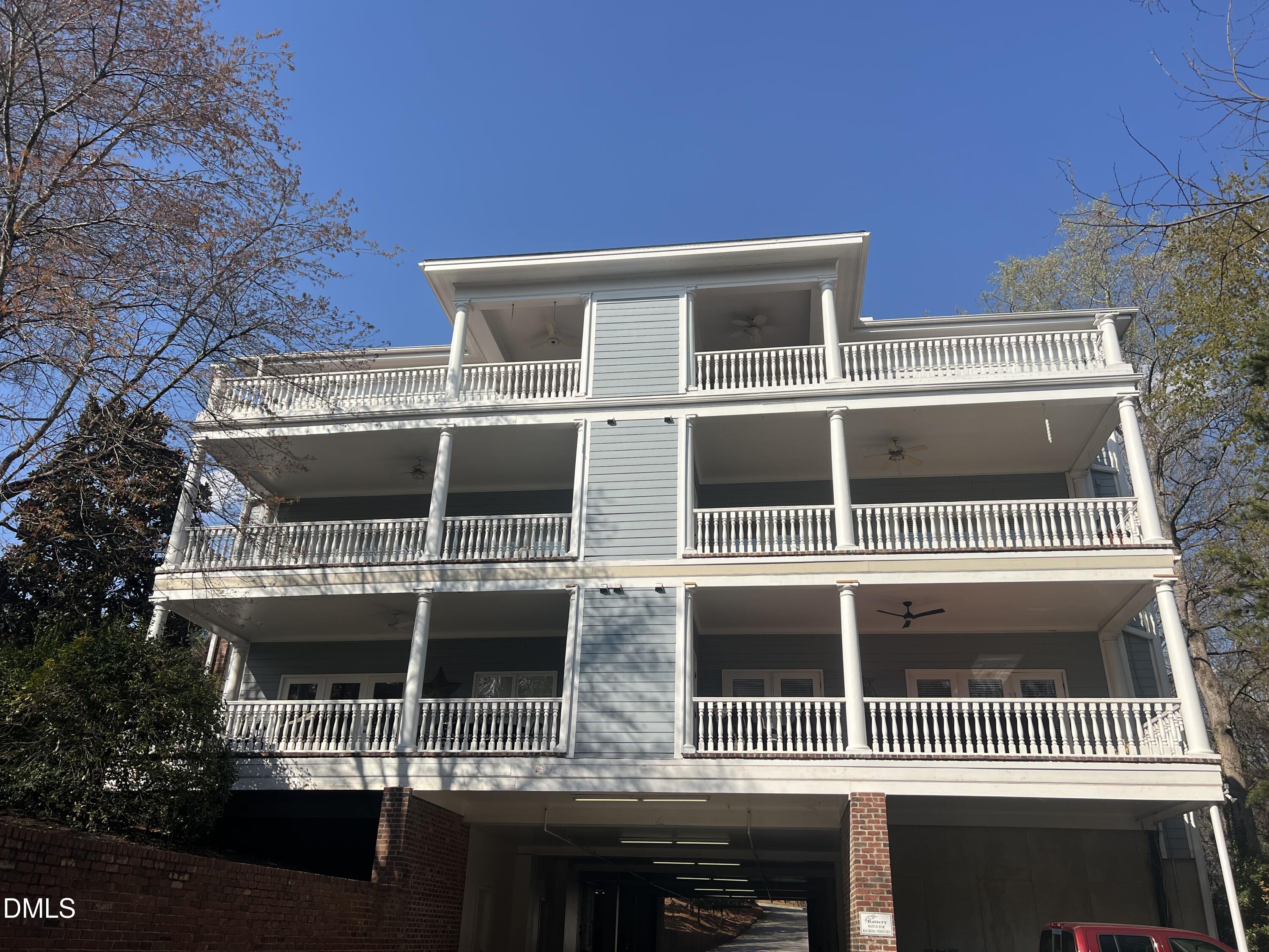7530 Lead Mine Road, Unit 202 Raleigh, NC 27615 - Photo 26 of 36 a front view of residential houses with street