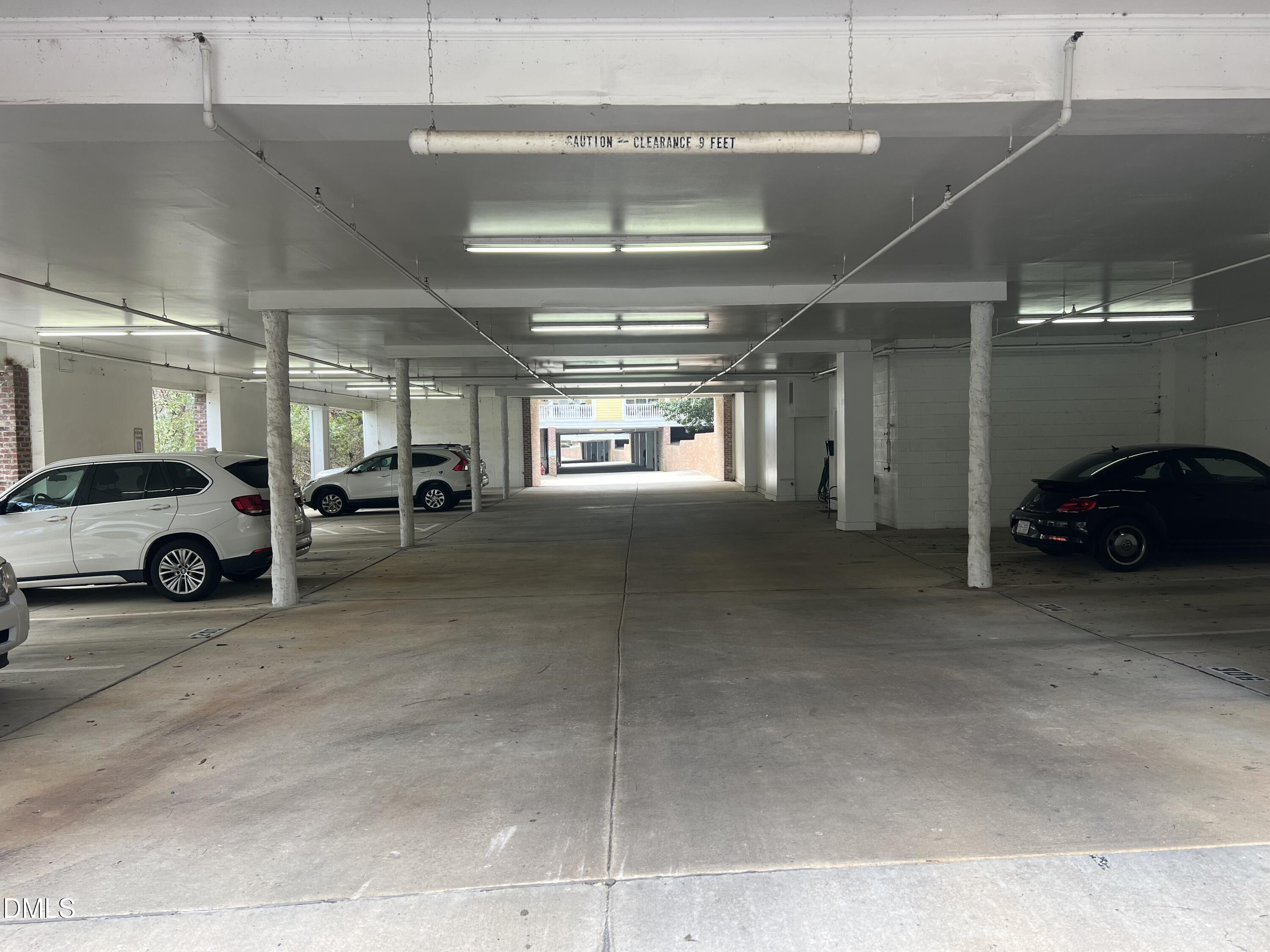 7530 Lead Mine Road, Unit 202 Raleigh, NC 27615 - Photo 28 of 36 a view of parking with cars parked