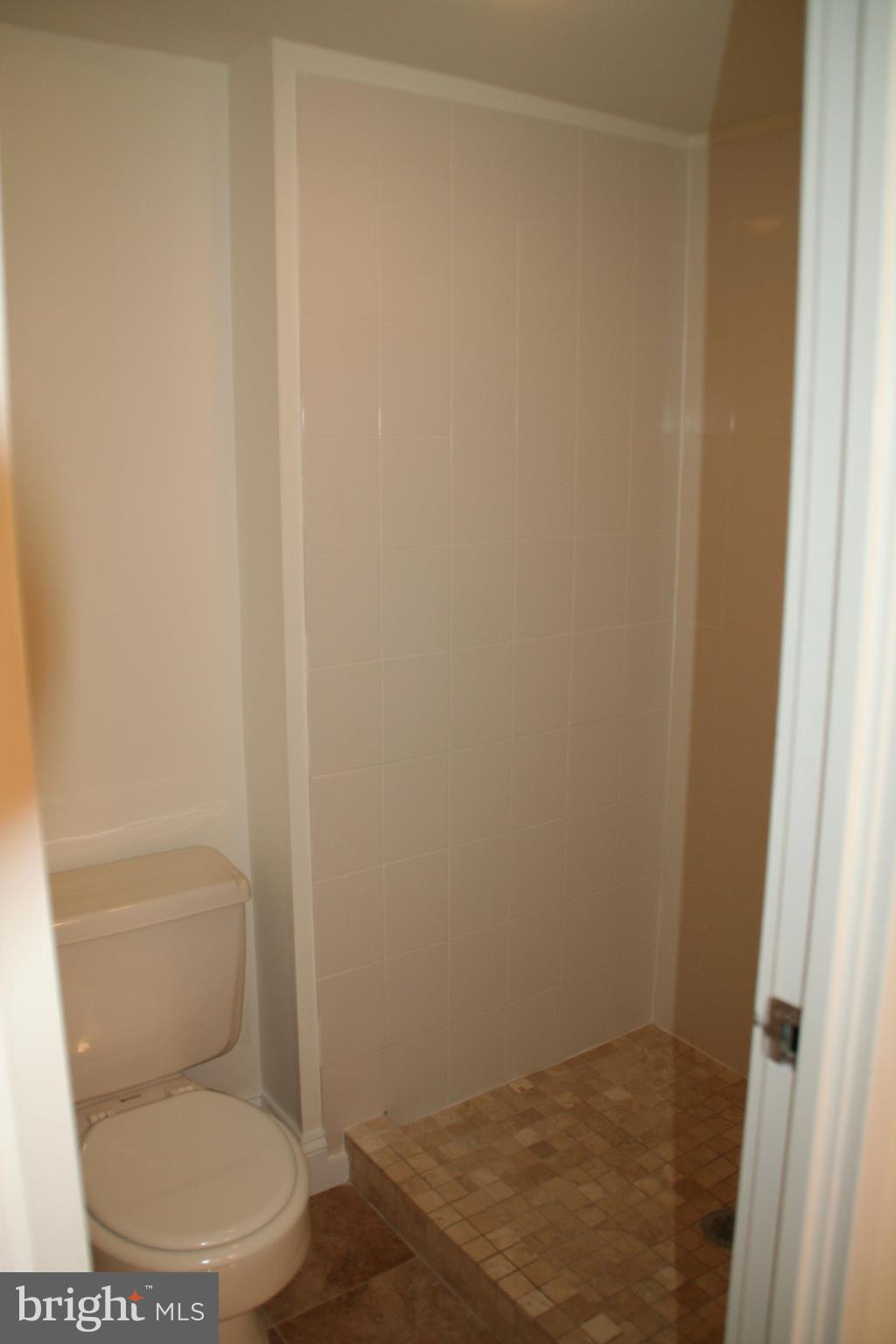 2216 Springwood Drive, Unit 102 Reston, VA 20191 - Photo 11 of 19 a bathroom with a toilet