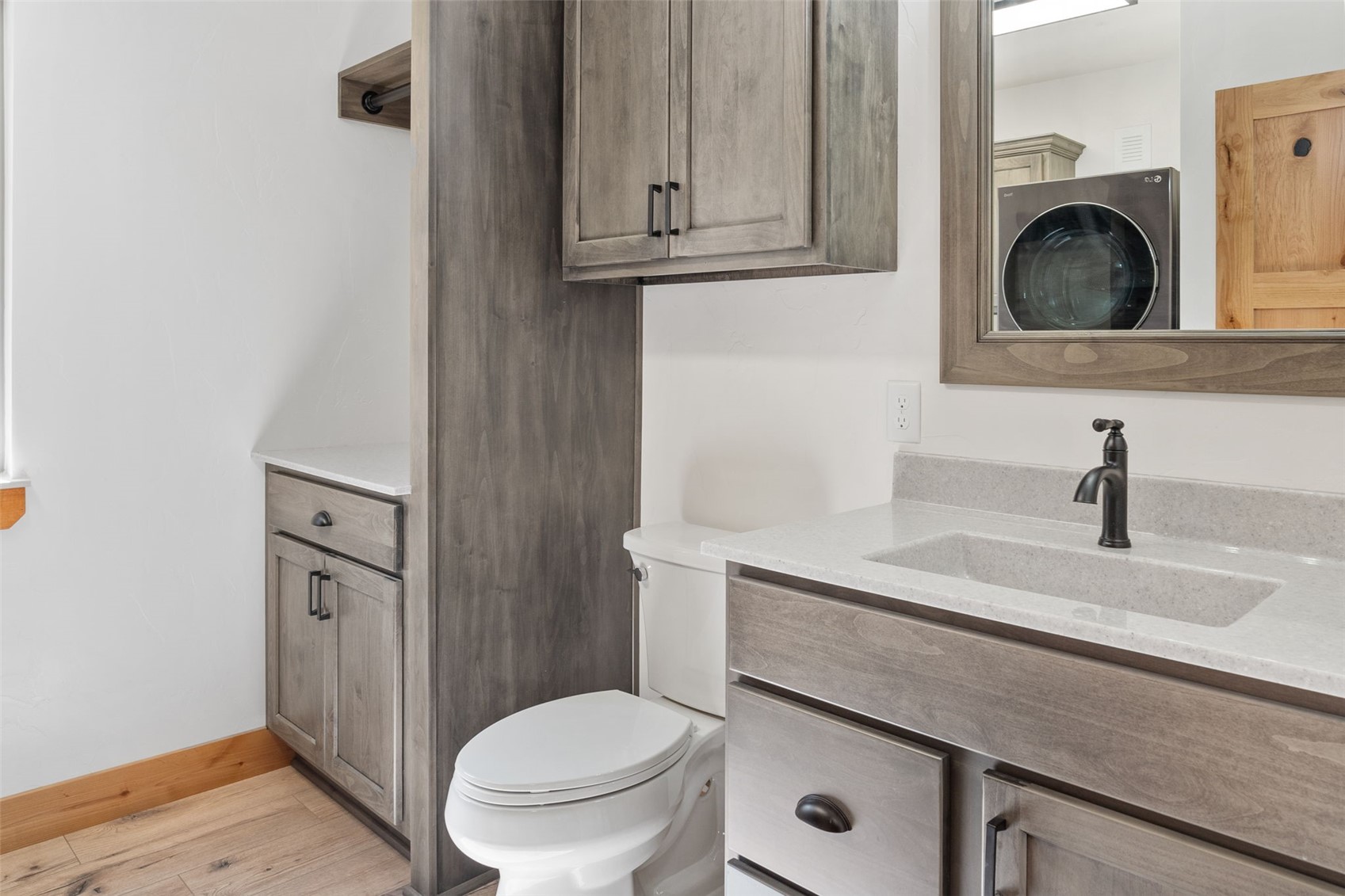3415 Redhill Road Fairplay, CO 80440 - Photo 33 of 50 a bathroom with a toilet a sink and mirror