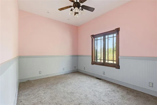 a view of a house with a large window